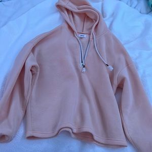 I am selling a crop jacket light pink/peach colored size L runs smaller